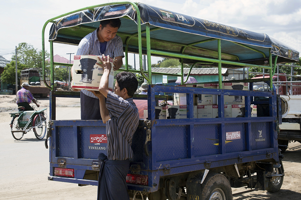 Envirofit cookstoves are unloaded for distribution in Myanmar's Dry Zone