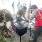 Plancha stove is assembled for use in relief shelter